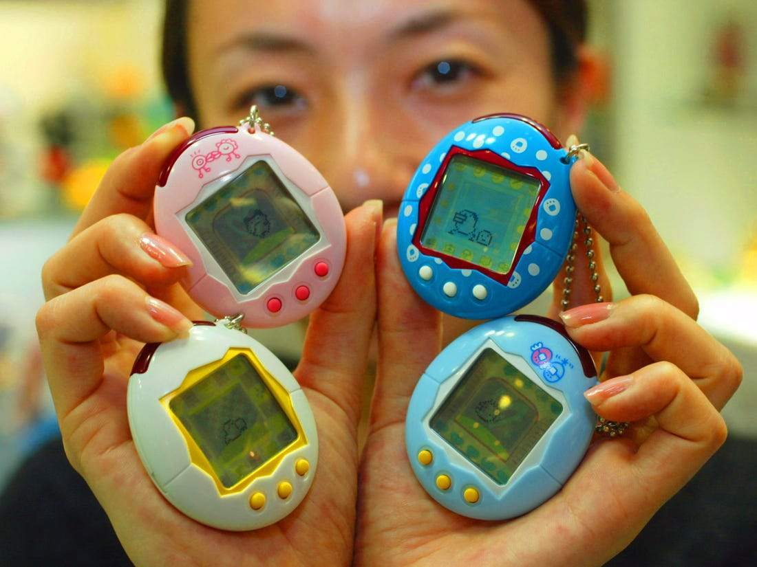 Vintage 1990s Tamagotchi digital pet egg toys in bright colors