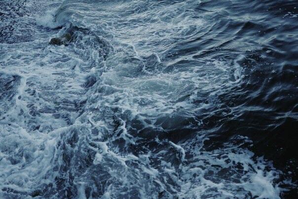 Dark, granite-colored ocean album artwork representing the abandoned Ocean Grunge music genre on Vapor95 Darknet.